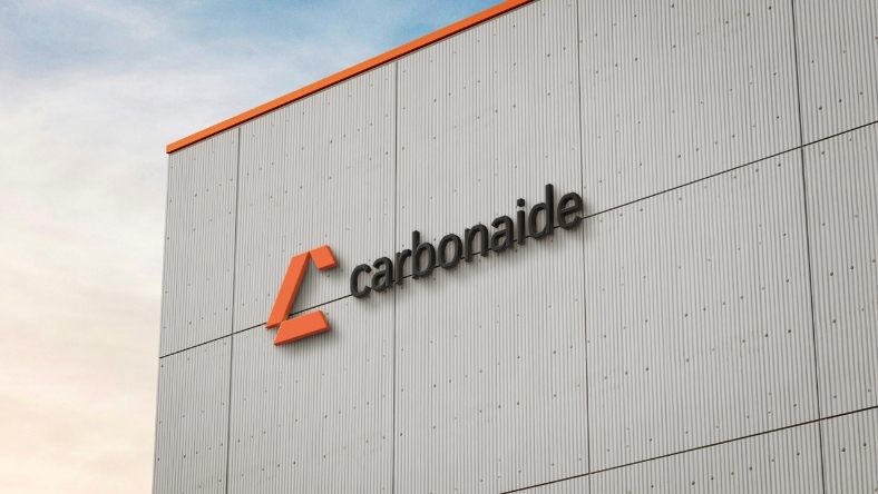 Carbonaide logo displayed on industrial facility exterior